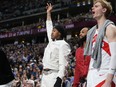 Toronto Raptors' Scottie Barnes (4) looks on in the second half of an NBA basketball game in Denver, Monday, March 11, 2024.