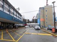 Burnaby Hospital, with the new wing under construction at right. A nurse at the hospital says patients who use illicit drugs can leave the hospital for up to six hours at a time and not lose their bed.