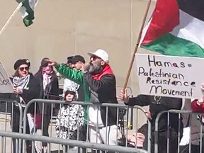 A group of protesters with Palestinian flags.