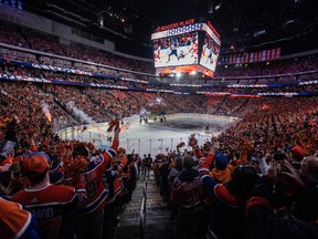 Fans cheer as the Los Angeles Kings and the Edmonton Oilers hit the ice for Game 1 of first round NHL Stanley Cup playoff hockey action in Edmonton, Monday, April 22, 2024.