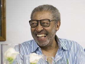 William Strickland laughs in theis 2016 photo in Austria. William Strickland, a longtime civil rights activist and supporter of the Black Power movement who worked with Malcom X and other prominent leaders in the 1960s, has died.
