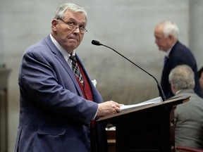 State Rep. John Ragan, R-Oak Ridge, presents a bill to vacate the entire Tennessee State University board of trustees during a House session Thursday, March 28, 2024, in Nashville, Tenn.