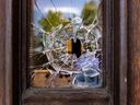 A bullet hole is seen in the front door of the Young Israel of Montreal synagogue on May 30, 2024, after the place of worship was hit by gunfire.