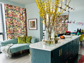 In a recent kitchen reno, Cori Halpern celebrated the return of texture with a curved, fluted island in bold blue, which matches the contours of an organically shaped couch.