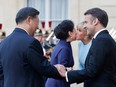 Emmanuel Macron and Xi Jinping