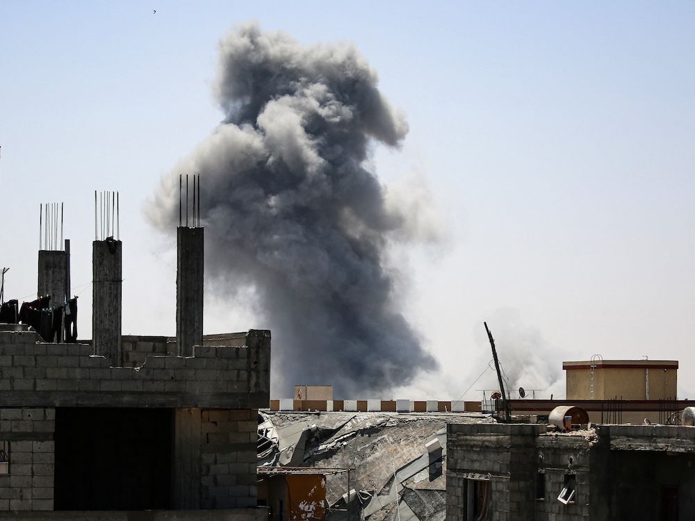 NextImg:Israel says Rafah blaze caused by a hidden store of Hamas weapons rather than the airstrike