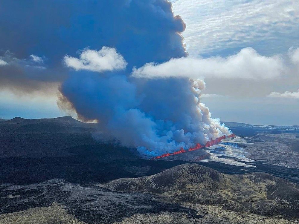 NextImg:An Iceland volcano starts erupting again, spewing lava into the sky