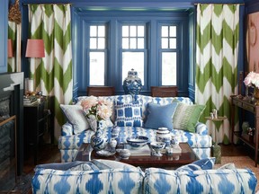 A gilt mirror, vintage details and contrasting patterns make this ’80s-inspired room pop.