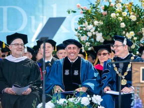 This photo provided by Duke University shows commencement speaker Jerry Seinfeld on stage during the school's graduation ceremony, Sunday, May 12, 2024, in Durham, N.C. A tiny contingent of graduates opposed the pro-Israel comedian speaking at their commencement Sunday, with about 30 of the 7,000 students leaving their seats and chanting “Free Palestine!” amid a mix of boos and cheers.