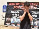 Kibbutz Kfar Aza resident Eilon Kutler, speaking to a group about how Hamas killed his best friend.