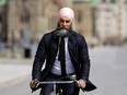 Jagmeet Singh riding a bicycle.