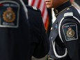 A Canada Border Service Agency member looks on before a ceremony at the legislature in Victoria, Sunday, Sept. 24, 2023.