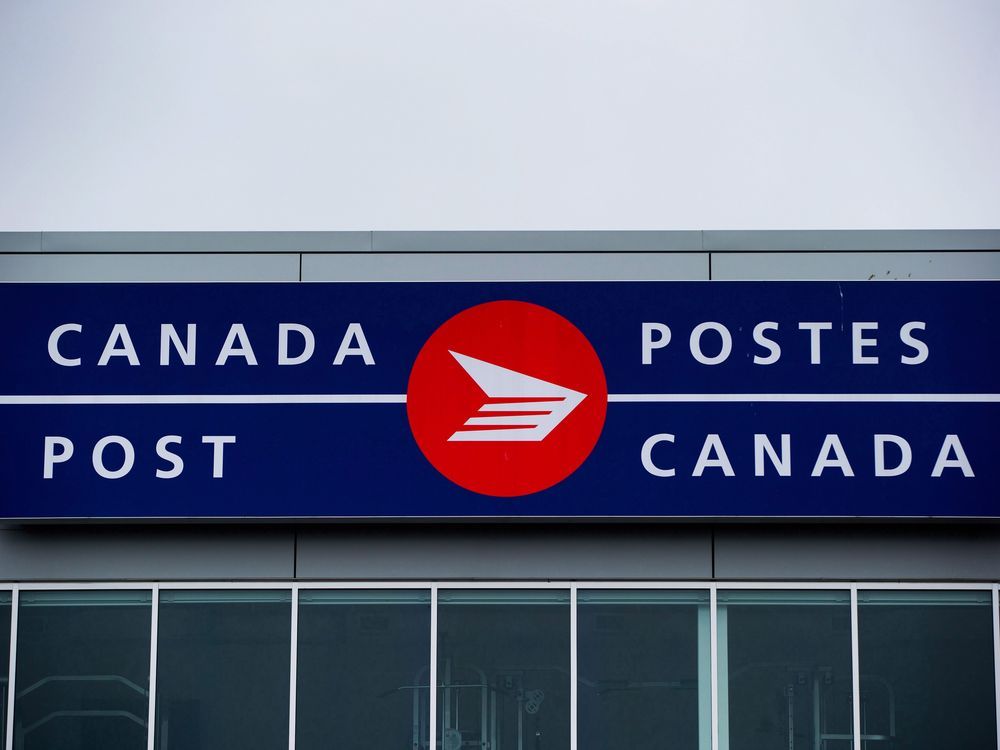NextImg:Mailing a letter across Canada gets a little expensive as stamp price hike takes effect today