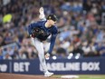 Tampa Bay Rays starting pitcher Tyler Alexander (14) throws the ball during first inning MLB baseball action against the Toronto Blue Jays in Toronto, Friday, May 17, 2024.