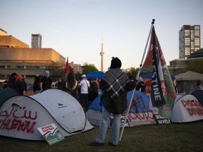 Protesters gather in an encampment set up on the University of Toronto campus in Toronto on Thursday, May 2, 2024.