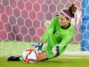 Canada's Stephanie Labbe makes a save against Sweden in the sixth round of the penalty shoot-out in the women's soccer final during the summer Tokyo Olympics in Yokohama, Japan on Friday, August 6, 2021.