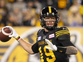 Hamilton Tiger-Cats quarterback Bo Levi Mitchell (19) gets set to throw against the B.C. Lions during first half CFL football game action in Hamilton, Ont. on Friday, October 13, 2023.