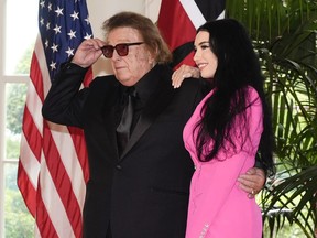 Don McLean and Paris Dunn arrive at the Booksellers area of the White House for the State Dinner hosted by President Joe Biden and first lady Jill Biden for Kenya's President William Ruto and Kenya's first lady Rachel Ruto, Thursday, May 23, 2024, in Washington.