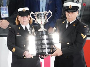 The memorial cup trophy is carried onto the ice before the first game of the Memorial Cup championship between the Hamilton Bulldogs and the host Saint John Sea Dogs in Saint John, N.B. on Monday, June 20, 2022.