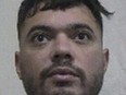 This picture provided by Interpol shows Mohamed Amra, a convict that escaped from prison on Tuesday. May 14, 2024. A massive manhunt is underway in France on Wednesday, May 15, 2024, for an armed gang that ambushed a prison convoy, killing two prison officers, seriously injuring three others and springing the inmate they were escorting.