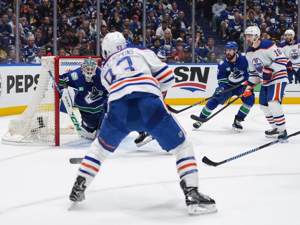 NextImg:Oilers advance to Western Conference final with 3-2 win over Canucks