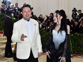 Elon Musk and Grimes arrive for the 2018 Met Gala