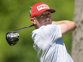 Mackenzie Hughes of Dundas, Ont. watches his tee shot on the 4th hole in the second round of the Canadian Open in Hamilton on Friday, May 31, 2024.
