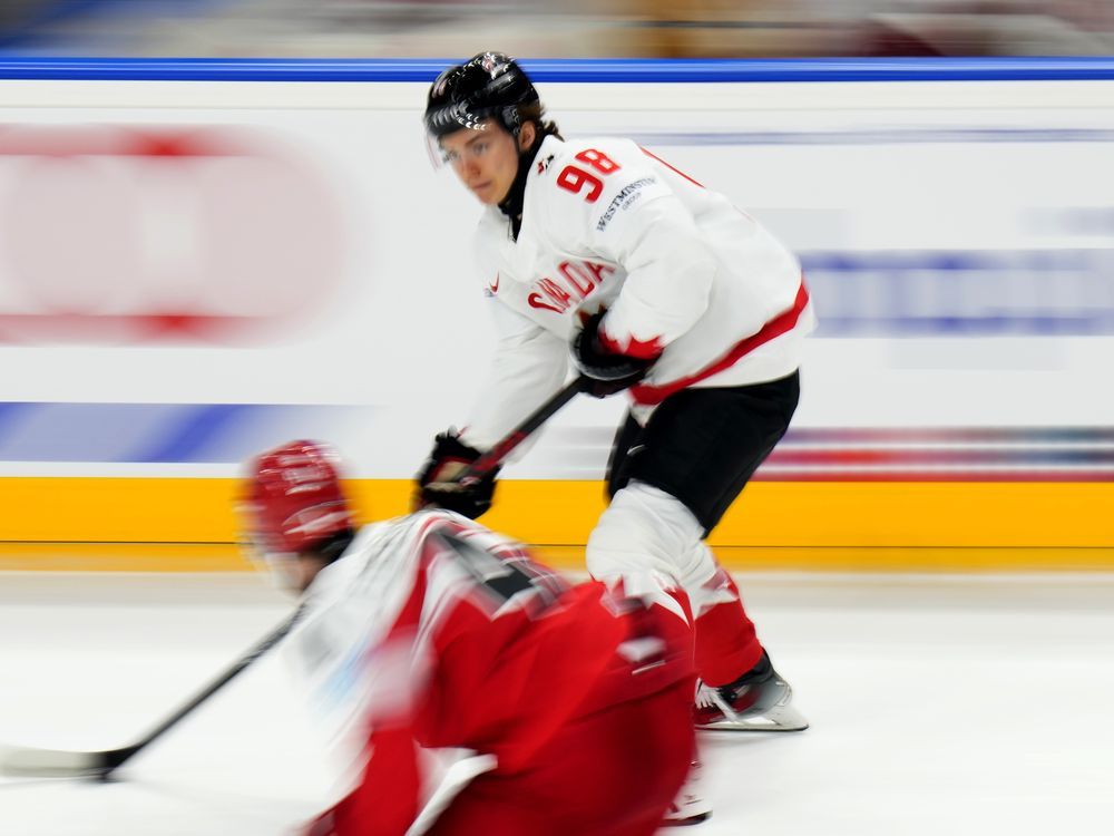 NextImg:Bedard's three-point effort leads Canada past Denmark 5-1 at hockey worlds