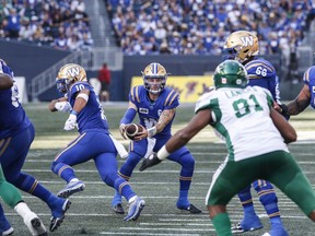 All eyes will be on Dru Brown to provide much-needed stability at quarterback this season for the Ottawa Redblacks. Brown (6), then with the Winnipeg Blue Bombers, fakes the handoff to Nic Demski (10) during second half CFL football action against the Saskatchewan Roughriders in Winnipeg, Saturday, Sept. 9, 2023.