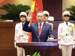 To Lam swears in the position after he was elected as the president at the National Assembly in Hanoi, Vietnam on Wednesday May 22, 2024.