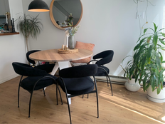 The EQ3 Mesa Round Dinette Table with oak top and white powder coated base.