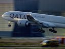 A Qatar airways plane lands in a European airport on Sept. 25, 2023.