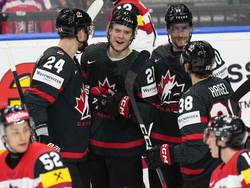 NextImg:Tavares scores in OT, rescues Canada from potential upset in 7-6 win over Austria