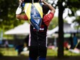 An athlete carries their boat away from the water at the Canadian Sprint Canoe and Kayak Championships at Mooney's Bay in Ottawa, on Sunday, Aug. 29, 2021. Rowing Canada chief executive officer Terry Dillon will step down next month ahead of the 2024 Olympic and Paralympic Games in Paris.