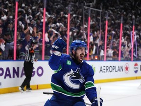 Vancouver Canucks' Conor Garland celebrates his goal against the Edmonton Oilers during the third period in Game 1 of an NHL hockey Stanley Cup second-round playoff series, in Vancouver, on Wednesday, May 8, 2024.