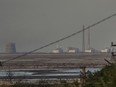 The Zaporizhzhia nuclear power plant, Europe's largest, in the background of the shallow Kakhovka Reservoir after the dam collapse, in Energodar, Russian-occupied Ukraine, June 27, 2023.