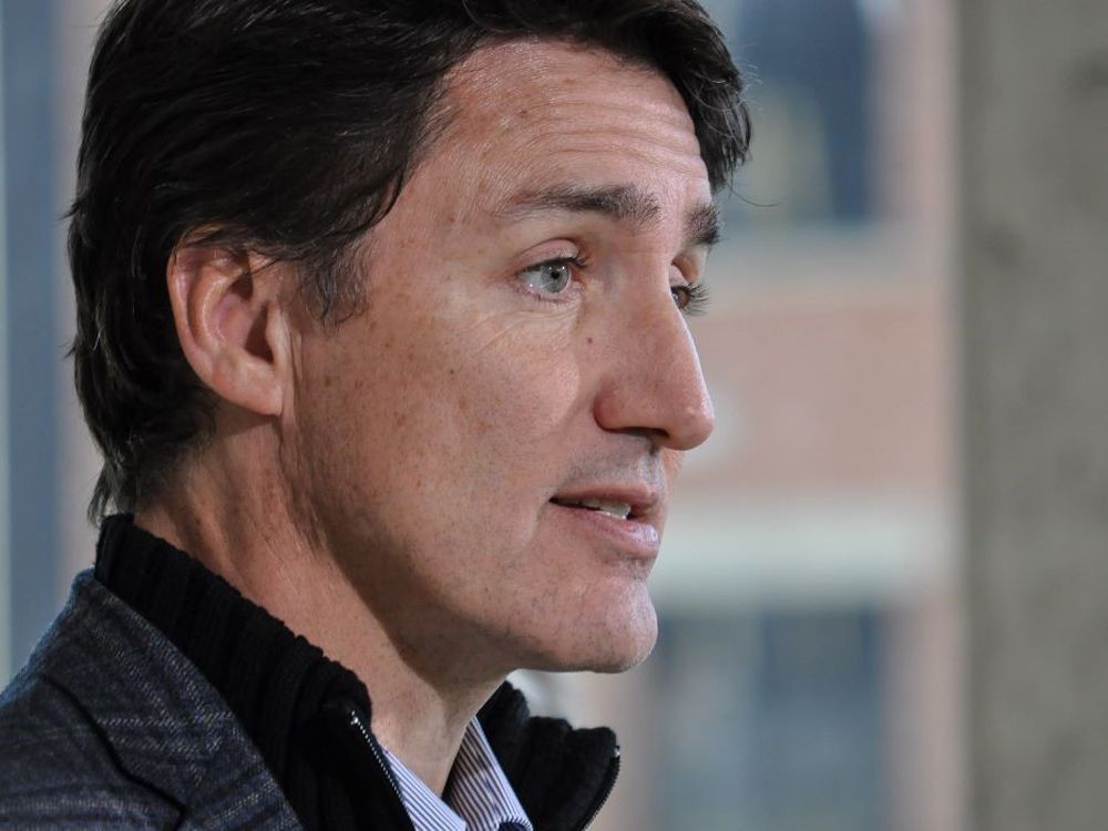 NextImg:Ontario man charged with threatening Justin Trudeau in online video