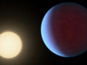This illustration provided by NASA in 2017 depicts the planet 55 Cancri e, right, orbiting its star. A thick atmosphere has been detected around the planet that's twice as big as Earth in a solar system about 41 light years away, researchers reported Wednesday, May 8, 2024. (NASA/JPL-Caltech via AP)