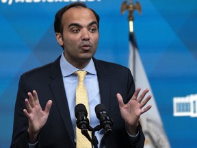 FILE - Consumer Financial Protection Bureau Director Rohit Chopra, speaks from the South Court Auditorium on the White House complex in Washington, April 11, 2022. Since its creation, the Consumer Financial Protection Bureau has faced lawsuits, political and legal challenges to the idea of whether the Federal Government's aggressive consumer financial watchdog agency should be allowed exist at all. Now cleared of any legal ambiguity, Chopra told reporters Friday, May 17, 2024, that the bureau plans to increase the size of its enforcement bureau, hiring additional investigators, and has already filed legal motions on roughly a dozen cases pending against companies accused of wrongdoing that have been held up due to the pending Supreme Court case.