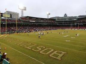 FILE - Boston College play SMU during the first half of the Fenway Bowl NCAA football game at Fenway Park Thursday, Dec. 28, 2023, in Boston. With the expanded College Football Playoff locked in through 2031, questions still remain about what the rest of the postseason will look like. One thing is certain, there will still be bowl games.