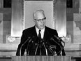 FILE - Chief Justice Earl Warren speaks at the Washington National Archives during a ceremony marking the 175th anniversary of congressional passage of legislation establishing the federal judicial system in the U.S., on Sept. 22, 1964. Seventy years ago, no one outside of the U.S. Supreme Court building heard it when Warren announced the historic Brown vs. Board of Education decision on school desegregation. Now, through the use of a voice-cloning technology, it is becoming possible for people to "hear" Warren read the decision as he did on May 17, 1954, along with oral arguments by lawyers.