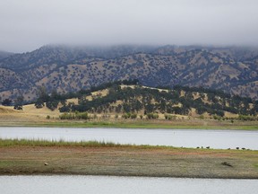 FILE - Lake Berryessa is seen with parts of California's newest national monument in the background, July 10, 2015, near Berryessa Snow Mountain National Monument, Calif. President Biden has expanded two culturally significant California landscapes: the San Gabriel Mountains National Monument in Southern California and Berryessa Snow Mountain National Monument in Northern California. The U.S. National Park Service notes that the move Thursday, May 2, 2024 was allowed under the Antiquities Act of 1906.