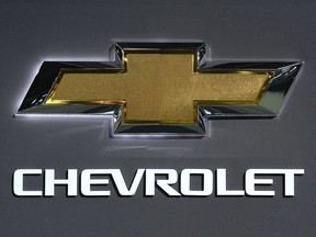 FILE - A Chevrolet logo is shown at the North American International Auto Show in Detroit, Sept. 13, 2023. The Chevrolet Malibu, the last midsize car made by a Detroit automaker, is heading for the junkyard. General Motors confirmed Thursday, May 9, 2024, that it will stop making the car introduced in 1964 as the company focuses more on electric vehicles.
