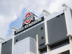 FILE - Clouds pass above The Ohio State University's football stadium, May 18, 2019, in Columbus, Ohio. A woman who fell from the stands to her death during a graduation ceremony at Ohio State University last weekend has been identified as a Georgia resident, authorities announced Tuesday, May 7, 2024.