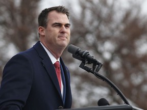 FILE - Oklahoma Governor Kevin Stitt gives his inaugural speech during ceremonies in Oklahoma City, Monday, Jan. 14, 2019.