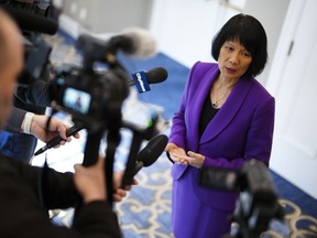 Olivia Chow speaking with reporters