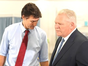Prime Minister Justin Trudeau and Ontario Premier Doug Ford attend an announcement at Seneca College in King City, Ont., Friday, Feb. 9, 2024.