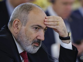 FILE - Armenian Prime Minister Nikol Pashinyan attends a meeting of the Supreme Eurasian Economic Council of the Eurasian Economic Union at the Kremlin in Moscow, Russia, on Wednesday, May 8, 2024. Thousands of protesters gathered Thursday, May 9, 2024, in the Armenian capital, Yerevan, to demand the resignation of Prime Minister Nikol Pashinyan over his government's decision to hand over control of border villages to Armenia's long-time rival Azerbaijan.