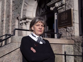 Lawyer Lynn Moore poses outside the Supreme Court in St. John's on Tuesday, Oct.4, 2022. Two more women have filed suits alleging they were sexually assaulted by an on-duty member of the Royal Newfoundland Constabulary who offered them a ride home from a night of drinking in downtown St. John's.