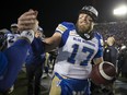 Winnipeg Blue Bombers quarterback Chris Streveler celebrates winning the 107th Grey Cup against the Hamilton Tiger-Cats in Calgary on Sunday, November 24, 2019. Streveler won't be flying to football games in a luxury private plane this season, but he's fine with that.THE CANADIAN PRESS/Todd Korol
